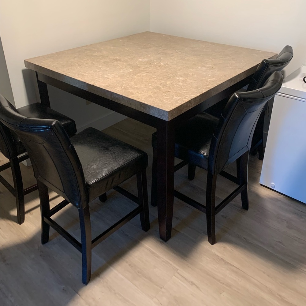 Marble table. 4 black high sittings chairs. 2 coffee tables